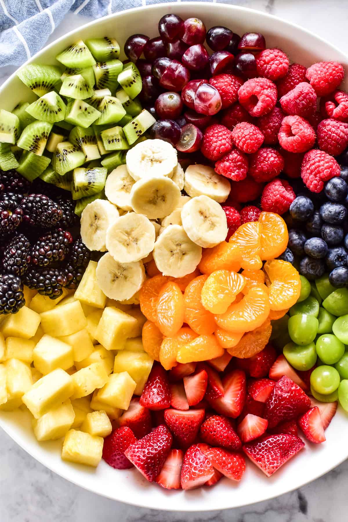 Close up of Fruit Salad ingredients in a white bowl