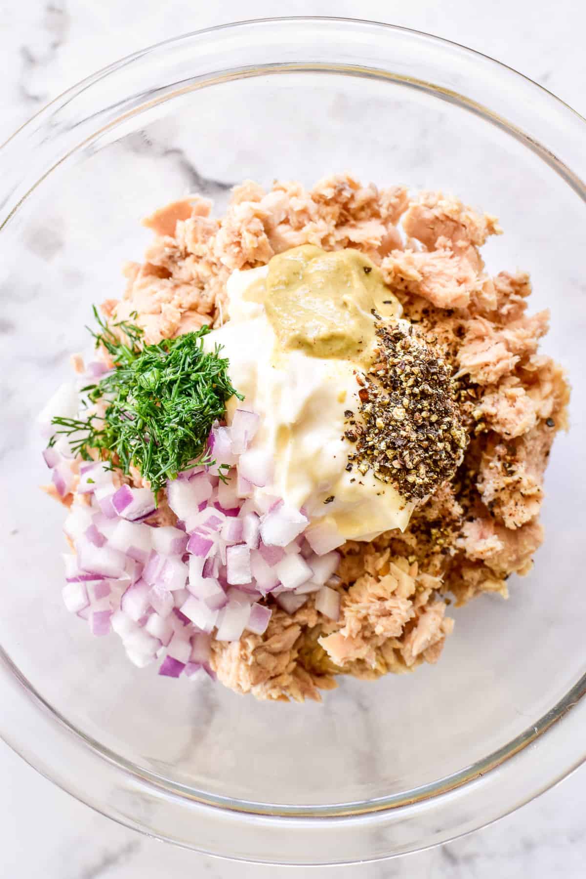 Salmon Salad ingredients in a mixing bowl