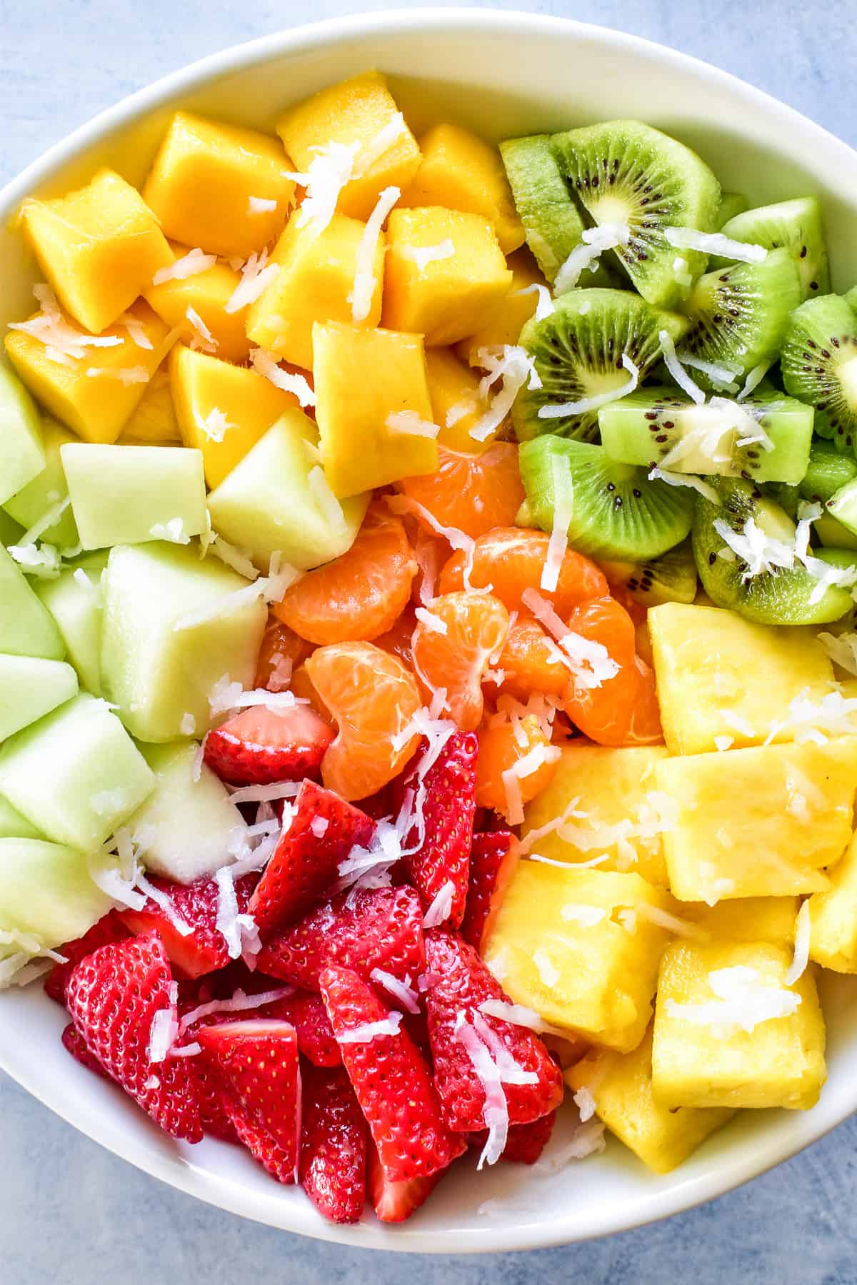 Tropical Fruit Salad ingredients separated in a serving bowl