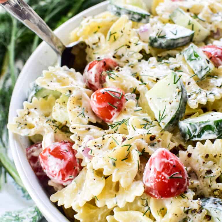 A variety of summer pasta recipes, including a vibrant summer pasta salad with cherry tomatoes, basil, and a light vinaigrette.