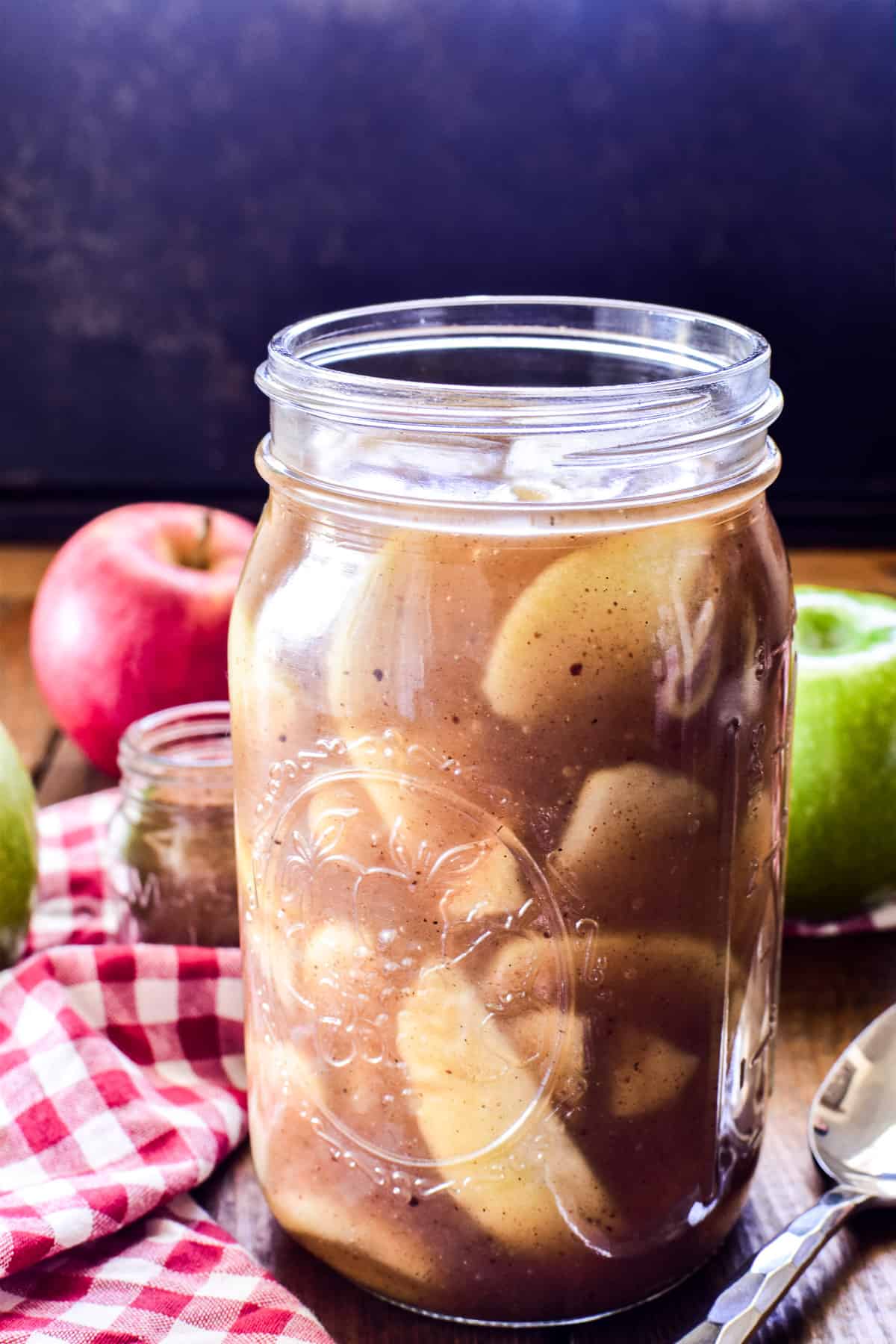 Glass Mason jar with homemade apple pie filling