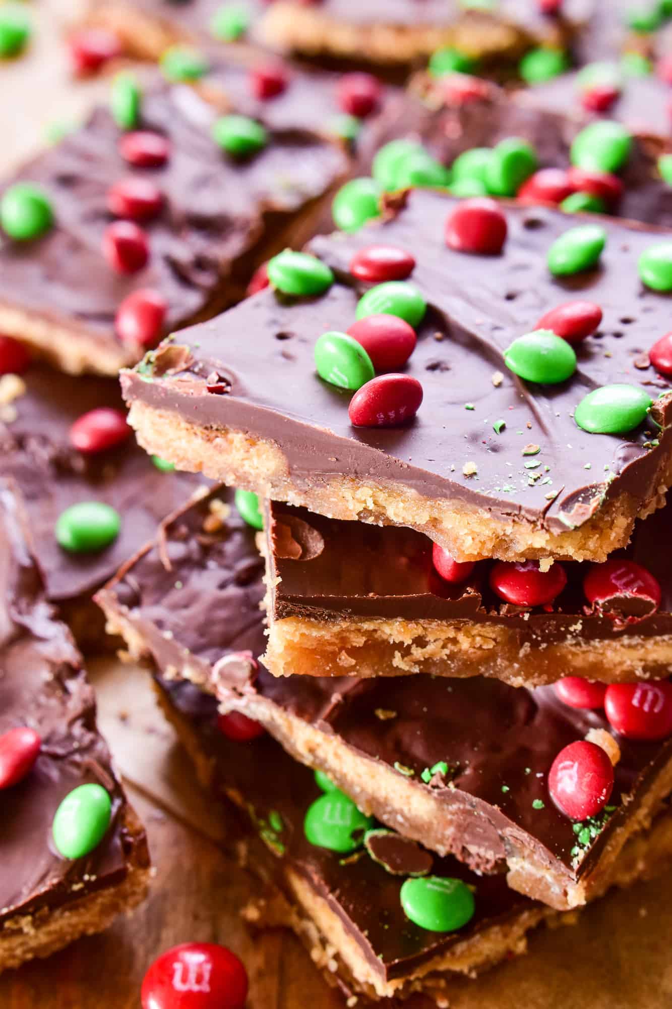 Christmas Crack pieces in a stack with red and green m&m's
