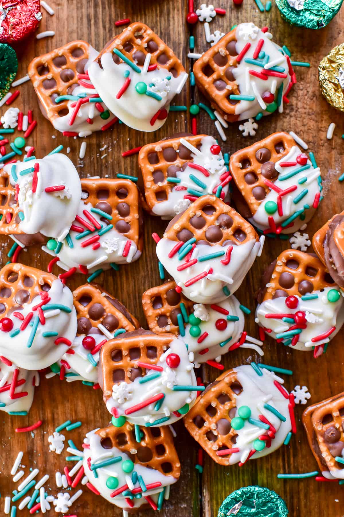 Overhead image of Chocolate Dipped Peanut Butter Pretzels with holiday sprinkles